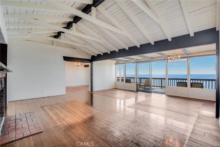 Prime spacious great room that opens up to panoramic ocean view deck.