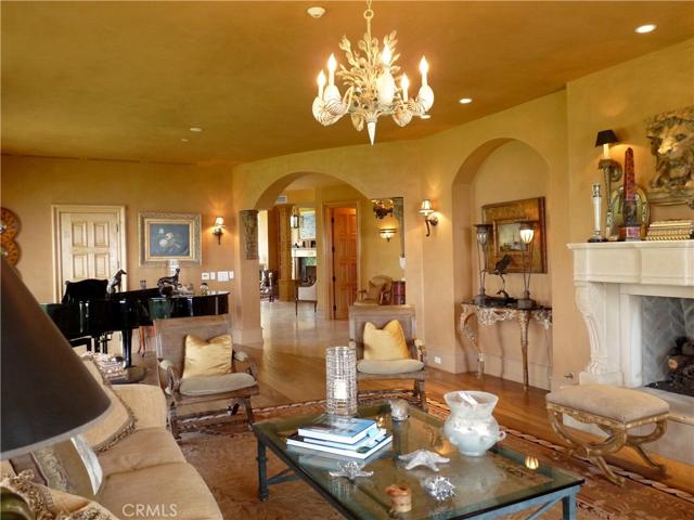 Formal Living room looking back towards large office and Dining area