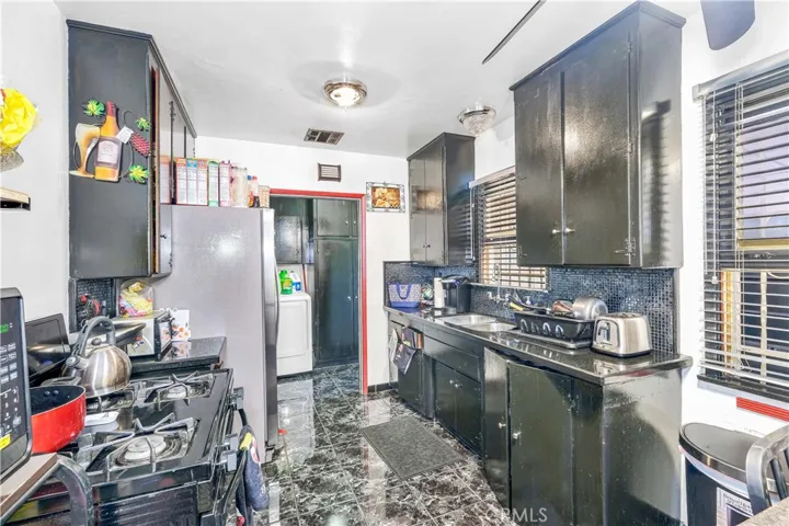 12210 Berendo Avenue, Los Angeles, California 90044