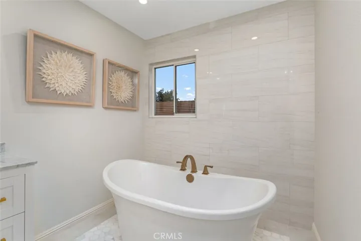 Separate tub in the master bathroom
