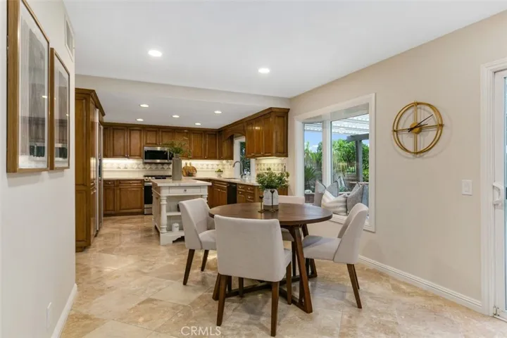 Directly adjacent to the kitchen