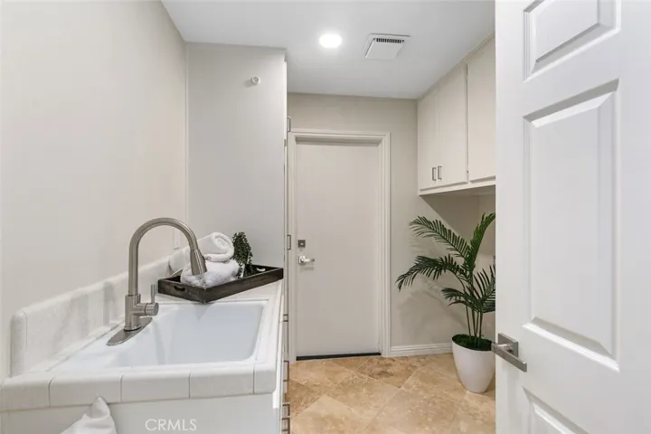 Indoor laundry area downstairs