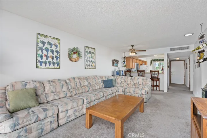 The spacious living room provides a versatile space for relaxation and leisure.

