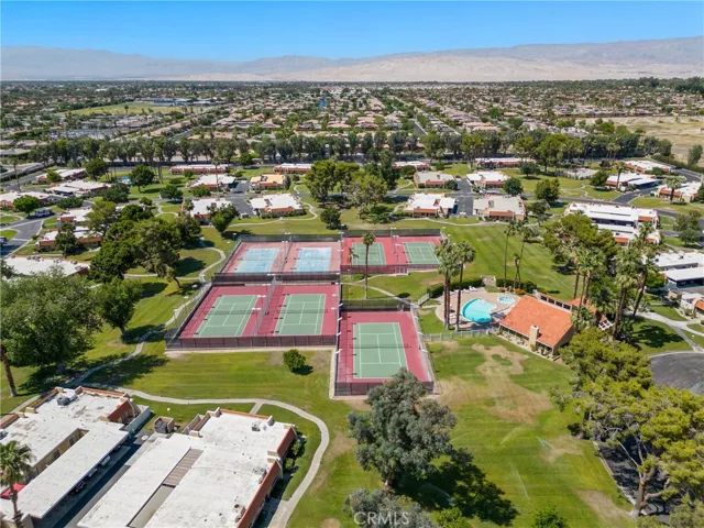 From above, the sprawling green spaces of Mountain View Villas invite relaxation and exploration.
