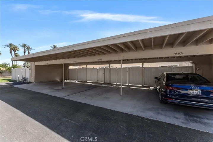 1 carport directly outside your back patio gate and ample guest parking.