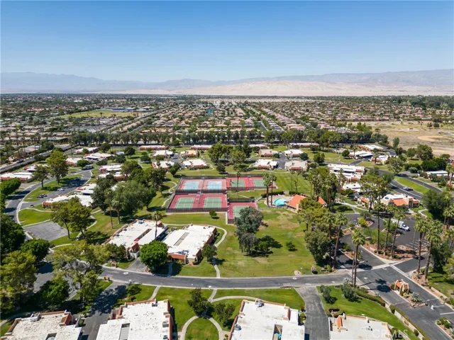 A bird's-eye view reveals the vast beauty of this serene community nestled in Rancho Mirage.
