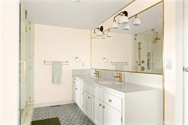 Master bedroom double sink full standing rain shower