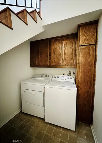 Private Laundry w/Side by Side Washer/Dryer & Under Stairs Storage Space