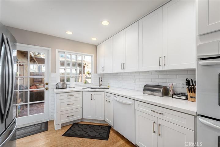 Large kitchen counters for easy prep to entertain and tons of cabinets for dishes, etc.