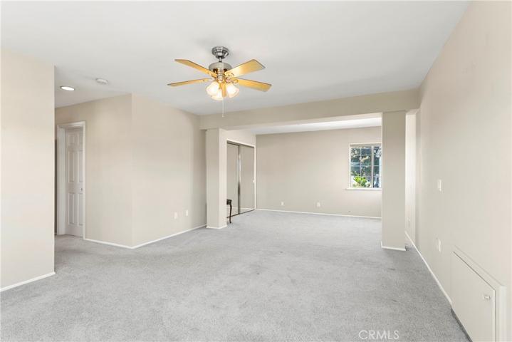 Another shot of the master bedroom and mirred closet and ceiling fan