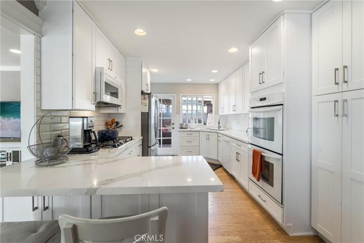 Fully remodeled kitchen just two years old with all the conveniences, roll outs and much more