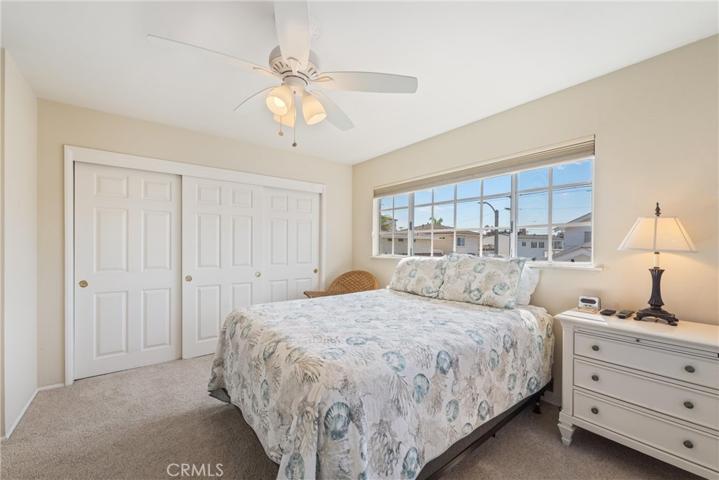 Guest room upstairs with large slider closet