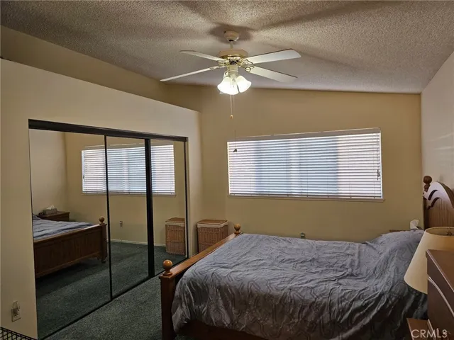 Mater bedroom with mirrored doors