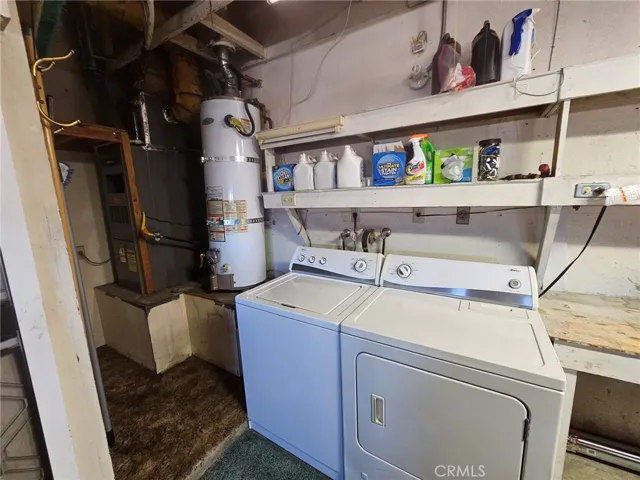 Laundry in garage and water heater washer dryer stay