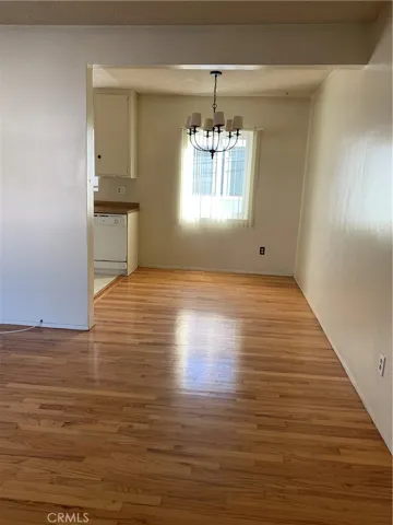 Unit C, dining area, when it was vacant.