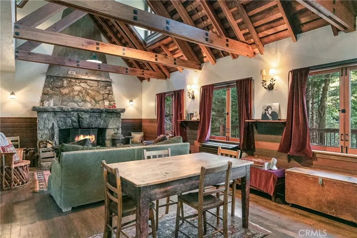 Open beamed ceilings, granite fireplace and oozing with charm