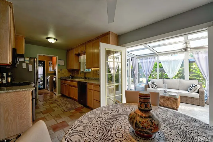 dinning area view into Kitchen and sunroom