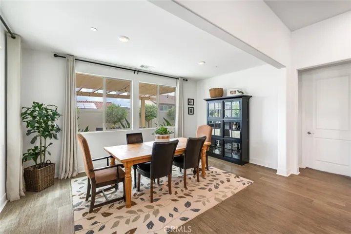 Dining room open to kitchen and family rooms.
