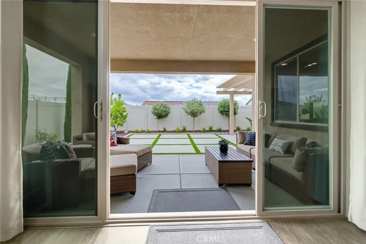 Family room with super-sized slider opens to California room and private back yard.