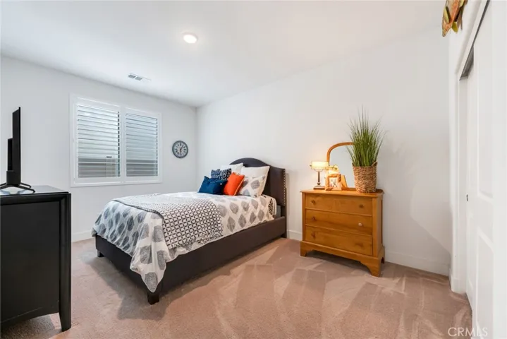 Secondary bedroom #2 with queen-sized bed.