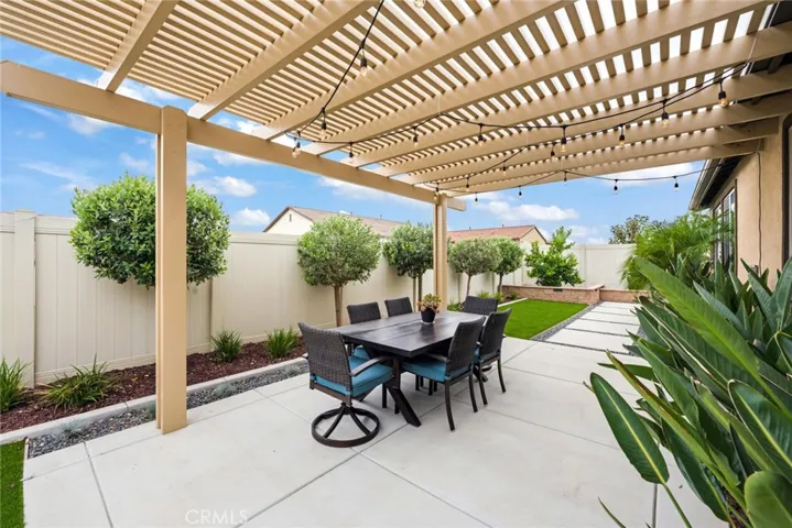 Beautiful and private back yard with multiple trees and fruit trees.