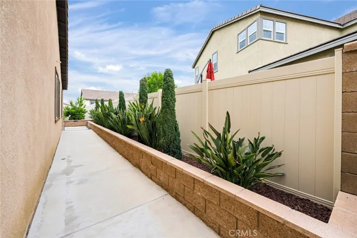 Wide side yard on both sides of home.