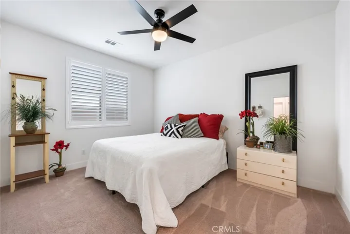 Huge secondary bedroom with queen-sized bed.
