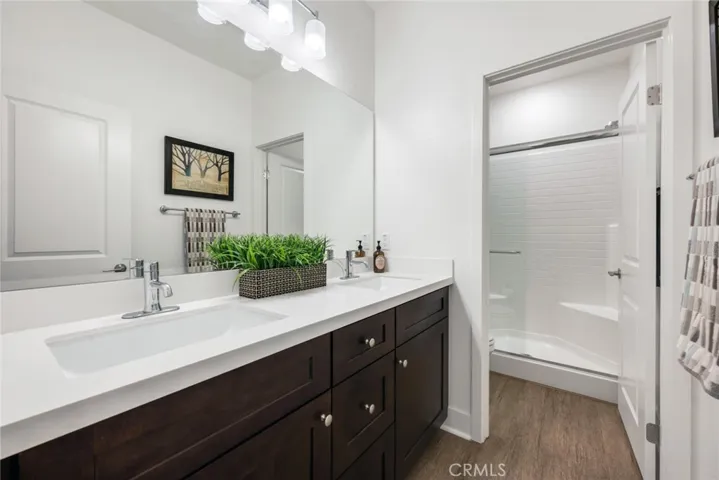 Secondary bath with dual sinks.
