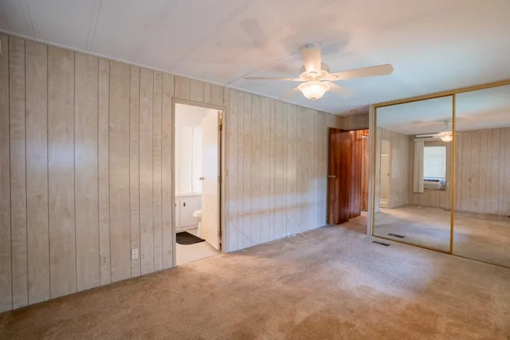 Main bedroom with doorway to main bath