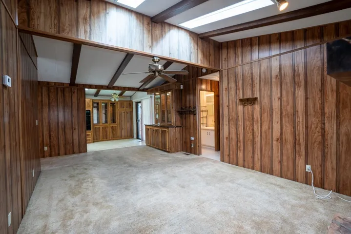 Family room looking into kitchen eating area and hallway to bedrooms