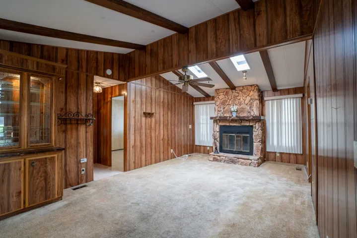 Family room showing hallway to bedrooms and second bathroom
