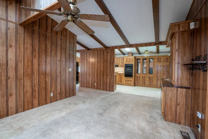 Family room looking into kitchen eating area