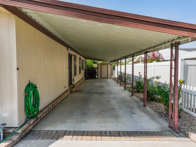 Carport with shed in rear