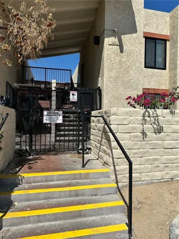 Combo lock on gate in front of bldg 1411 off Chia Rd.