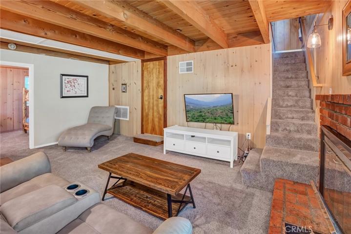 Downstairs den with fireplace