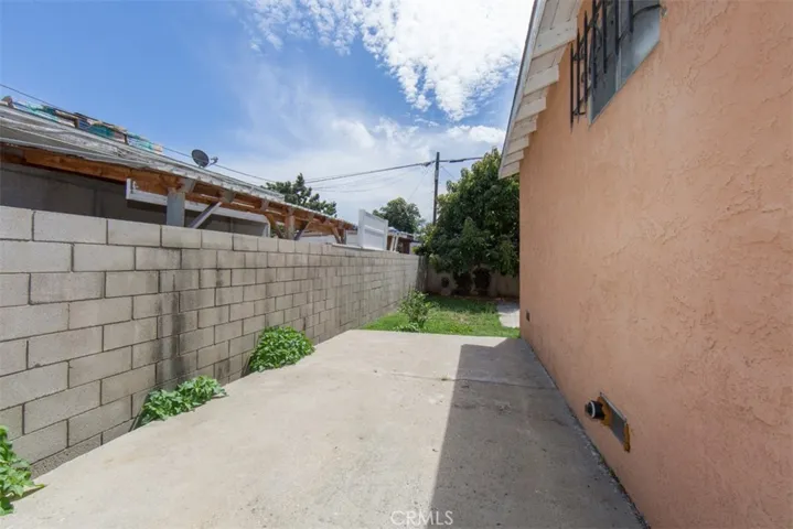 Side of house in backyard