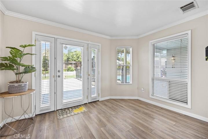 Elegant single door featuring screen vented sidelites