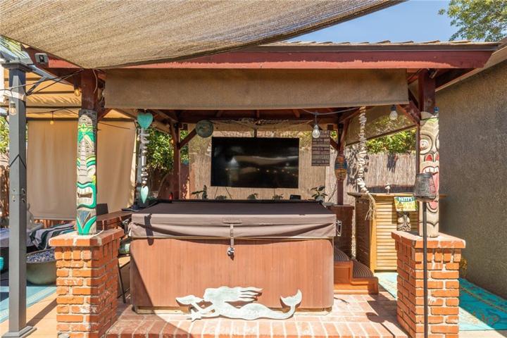 Hot tub with hanging TV
