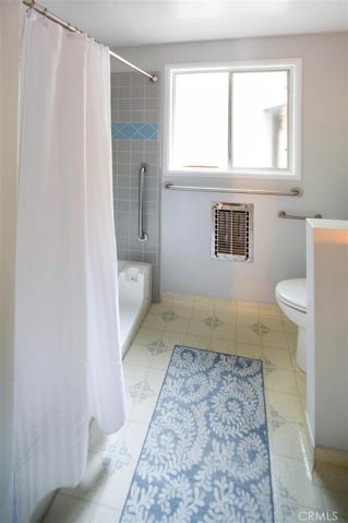 Full bath with lots of cabinet space.