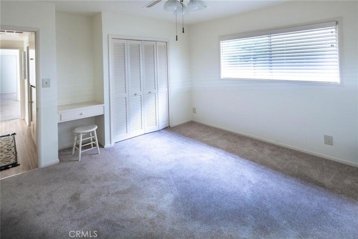 3rd bedroom with build in desk