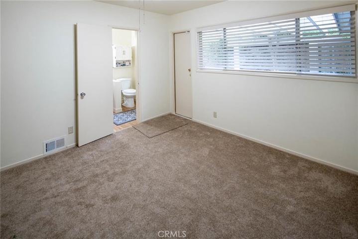 Primary bedroom  En-Suite with access to outside back yard.