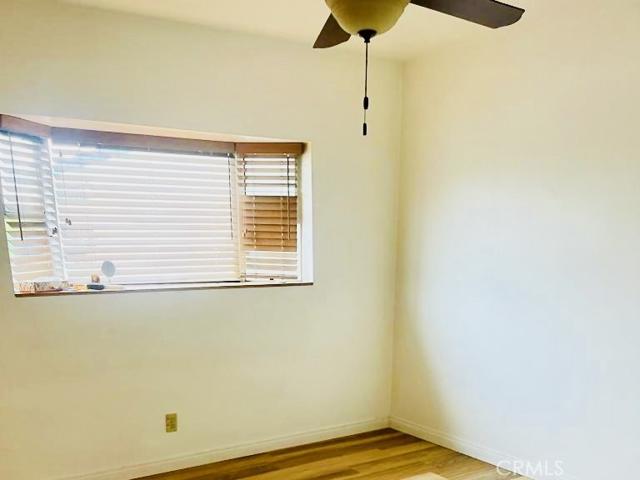This is one of the bedroom with ceiling fan