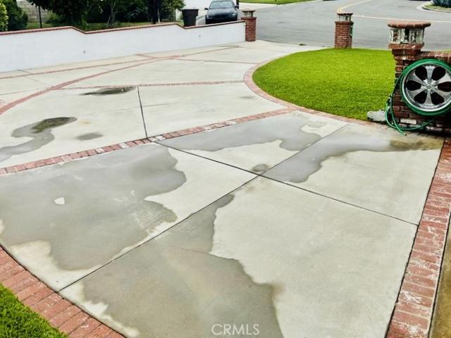 Entrance to the driveway in front of the garage