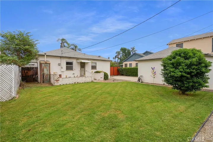View of entire backyard from back corner of yard.