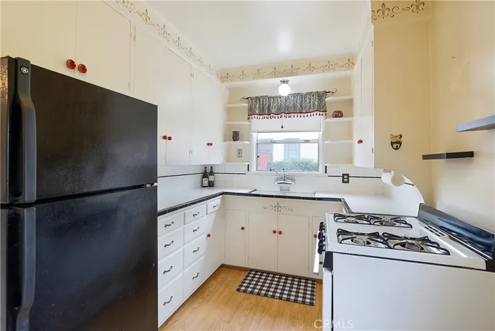 Gas stove and refrigerator included.