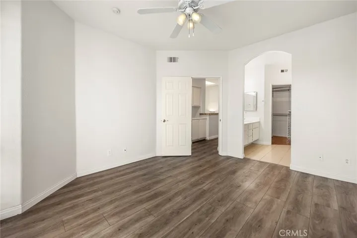 Looking into primary bathroom with double sink vanity.