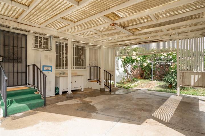 Door from laundry room to patio. Notice outdoor sink