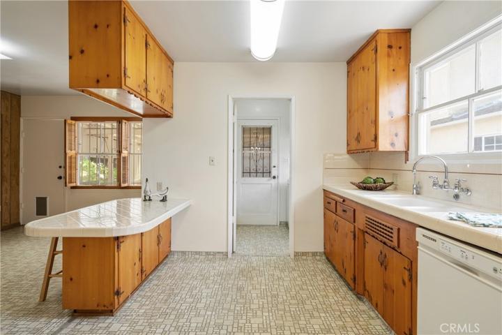 Kitchen view towards laundry room