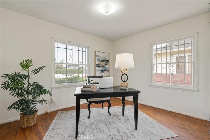 Front room, staged as office. This is bedroom #1.
