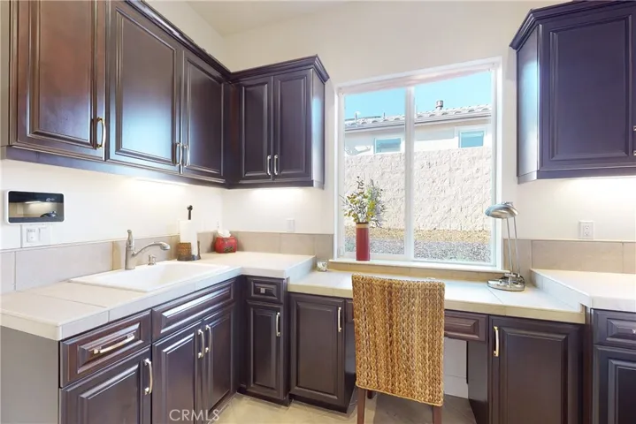 Utility room/Smart Space, washer & dryer hook-ups, room for office and has a walk-in pantry